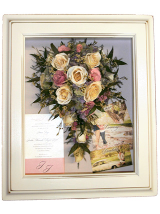 preserved bridal bouquet with pink and white roses in shadow box