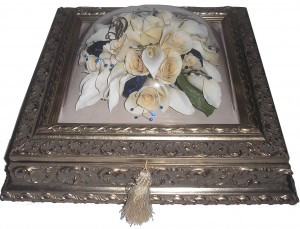 The brides bouquet preserved in a beautiful ornate jewelry box