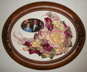 Real flowers dried for this couple to enjoy as a decoration on their wall.