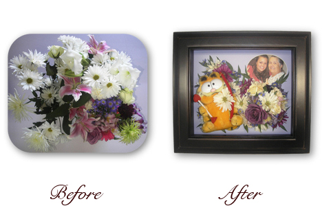 funeral flowers preserved with photo and personal items in brown square frame encasement