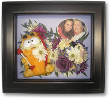 large rectangle shadow box with funeral flower preservation, photo, stuffed animal and other personal effects