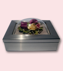 funeral flowers preservation displayed in silver jewelry box lid