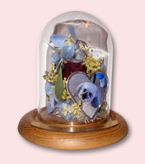 flowers preserved with photo of dog in table dome