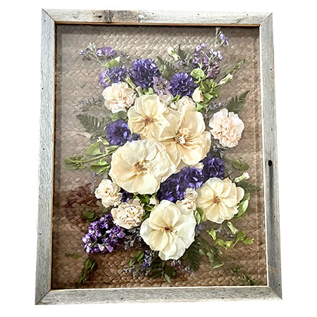 Roses pressed with purple flowers in rectangle barnwood encasement