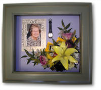 memorial flowers preserved and arranged with photo of mother and her watch