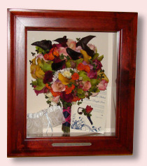 wedding bouquet preservation in reddish wooden shadowbox