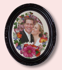 smiling wedding couple with preserved flowers
