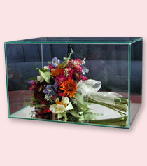 glass box with preserved bouquet